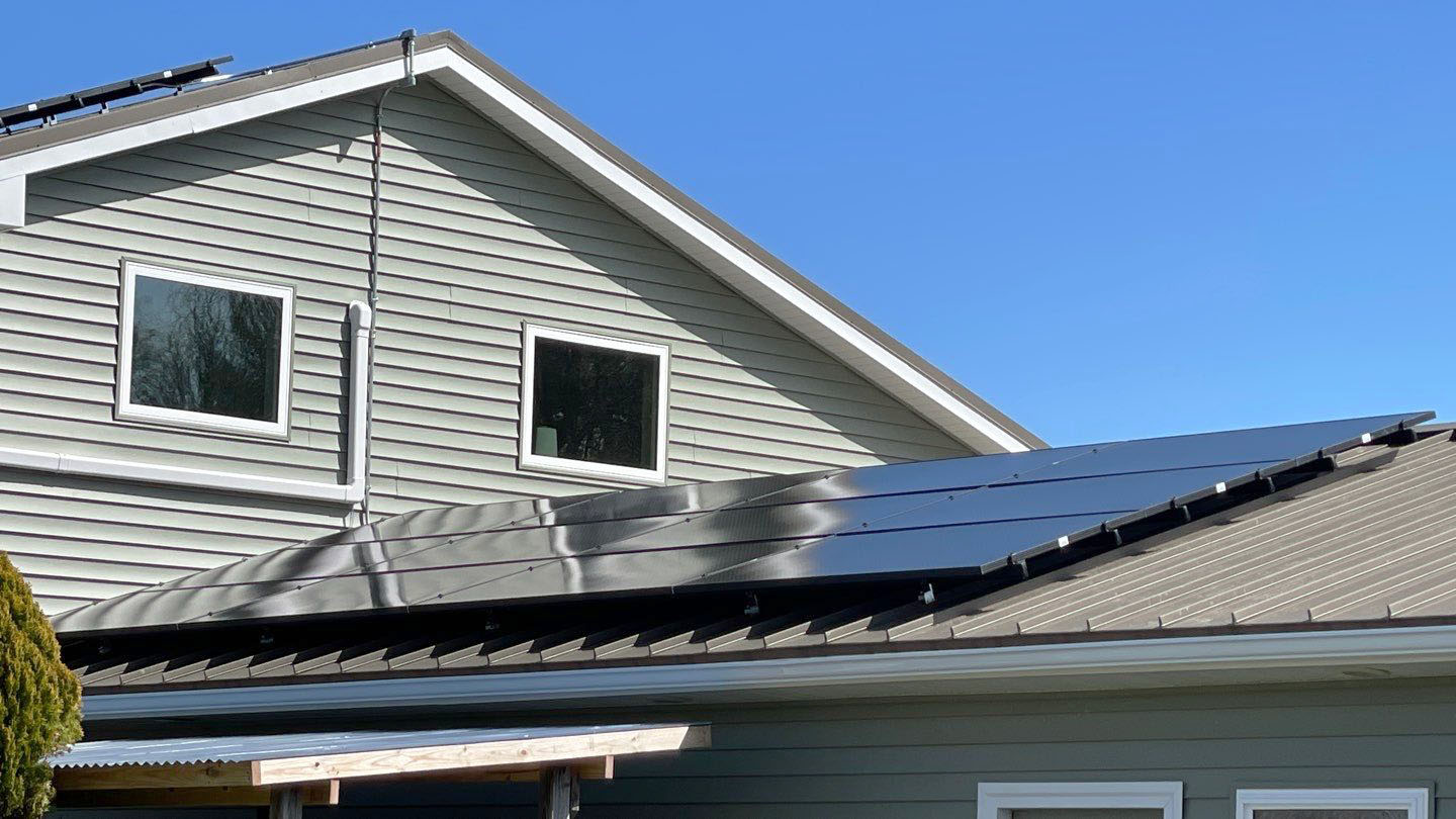 Integrated roofing and solar panel installation